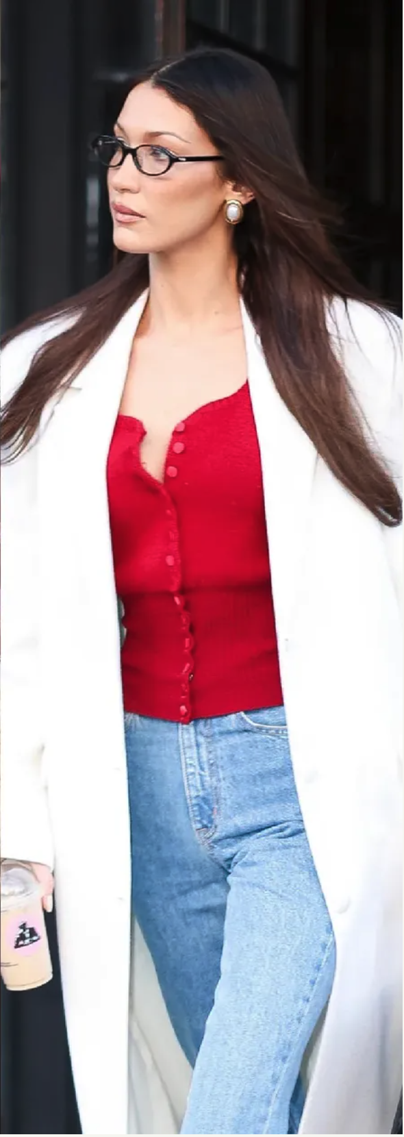 Chic street style with red knit top, white coat and light denim