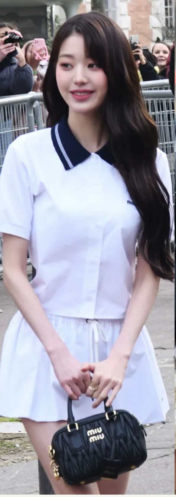 Tenniscore white set with mini skirt and black Miu Miu bag